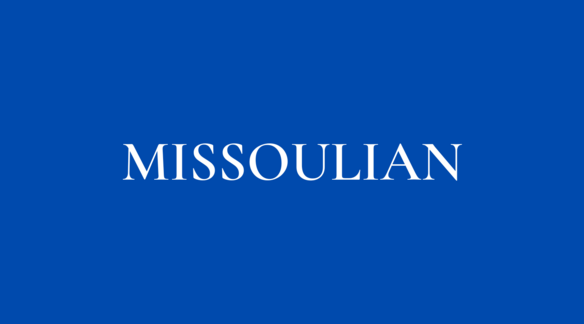 This is a navy blue title page for the Missoulian.